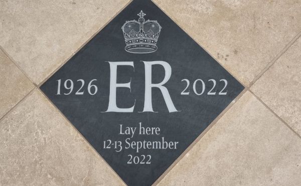 A stone inlaid in the floor of St Giles' commemorating the late Queen