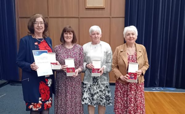 Volunteers from the Strathaven Memory Club receiving their awards